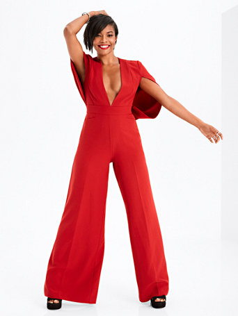 red jumpsuit with cape